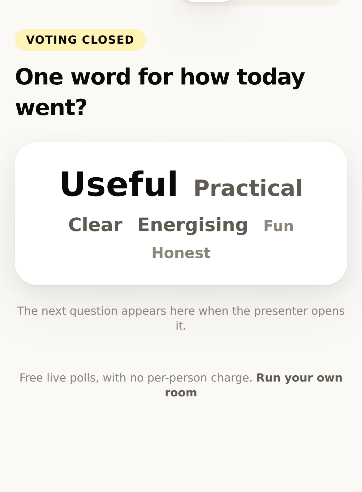 A phone showing the room's word cloud: Useful largest, then Practical, Clear, Energising, Fun and Honest